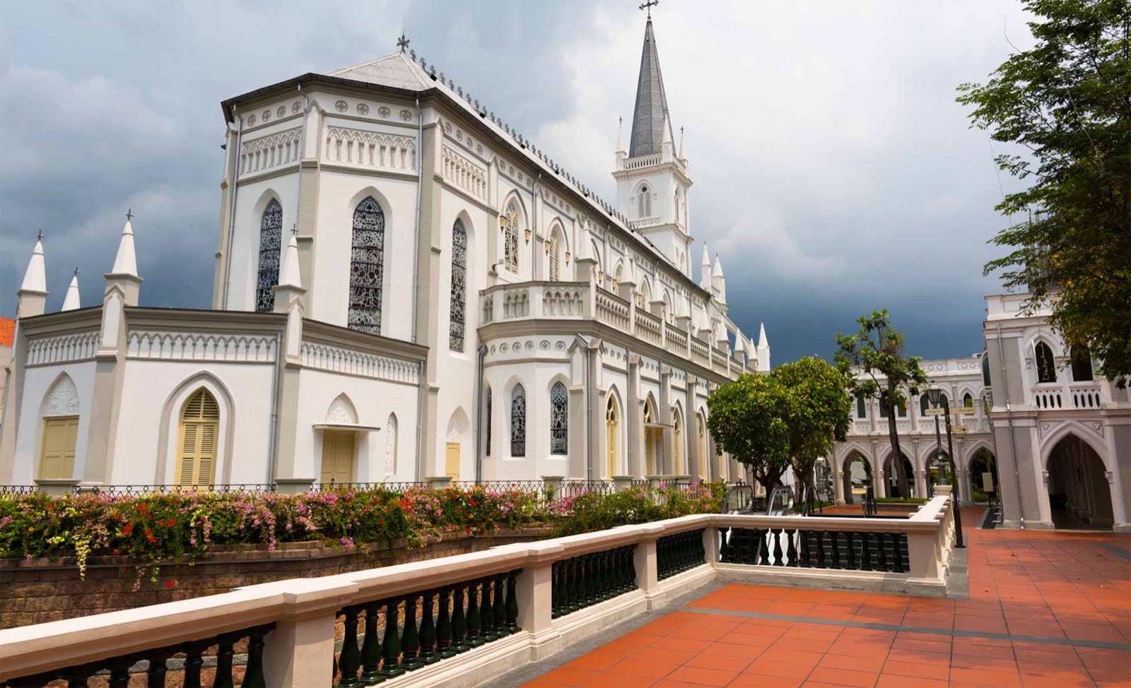 Exterior of the white Gothic CHIJMES Hall and its spire at CHIJMES, Victoria Street, Singapore