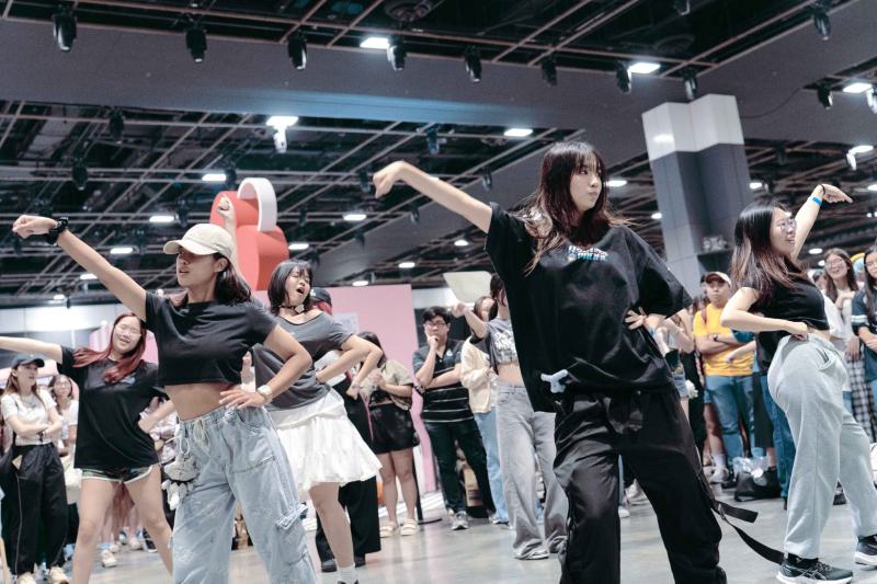 Young fans dance in a K-pop random play dance session at HallyuCon in Suntec, Singapore