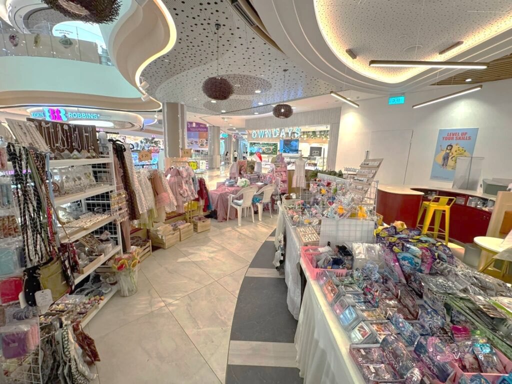 Multi-brand consignment shelves stocked with accessories, apparel and gifts inside a POPPIN unit by T Cartel, Singapore